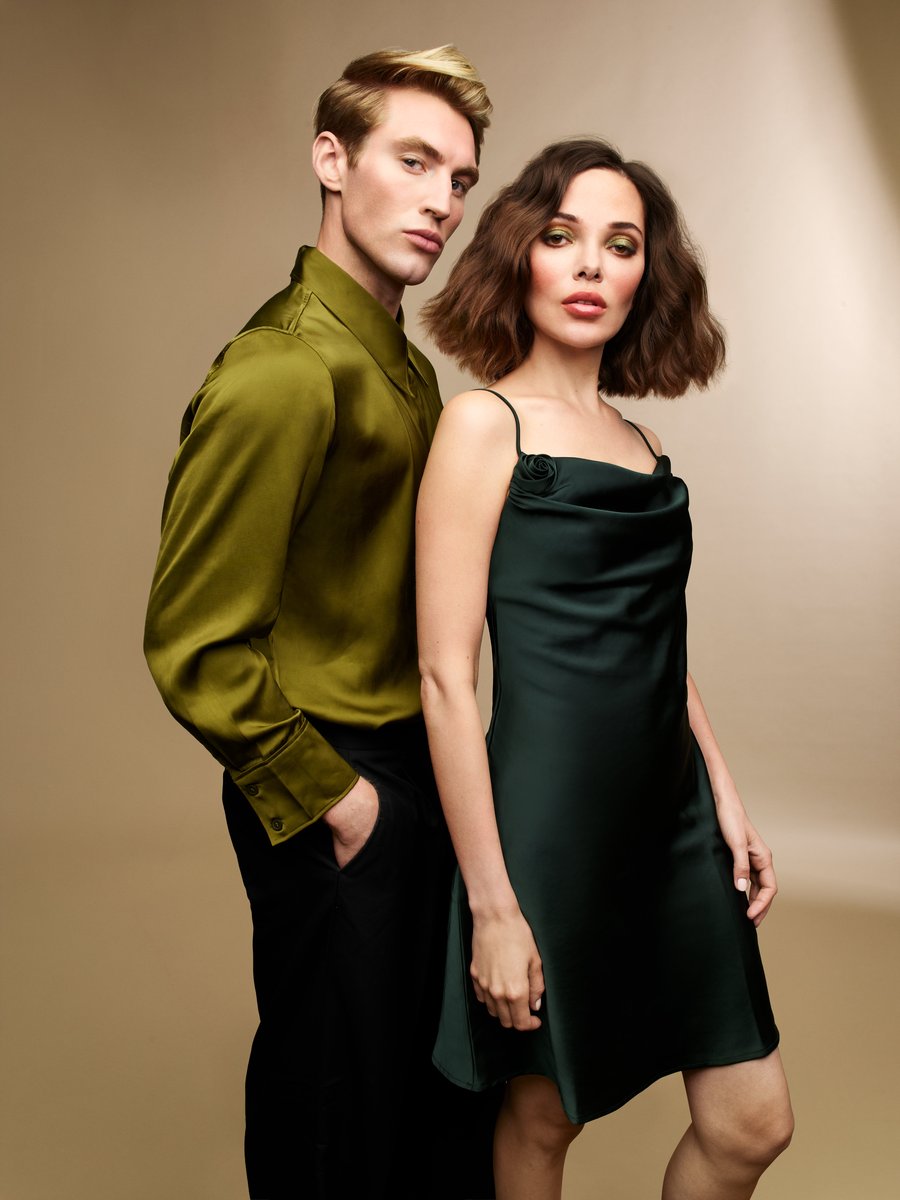 Couple in olive silk and emerald slip dress