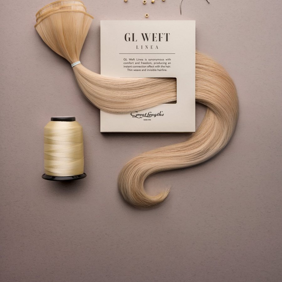 Great Lengths weft extensions with thread and needles